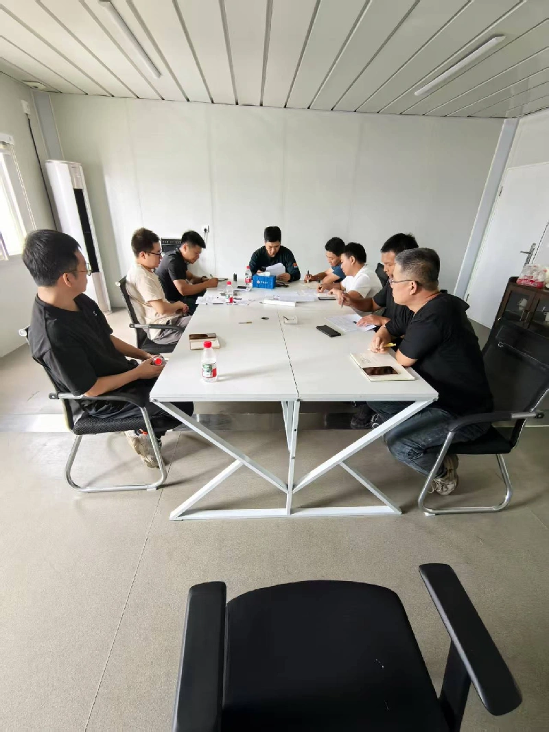 Alignez précisément avec les exigences de l'ordre des conteneurs de logement et renforcez les fondations de production grâce à des réunions d'échange de qualité